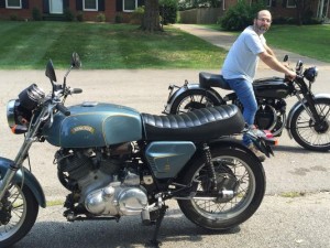 Matthew Biberman sitting on the recently finished Vincent Black Shadow.